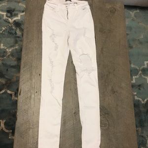 Highs waisted distressed white jeans